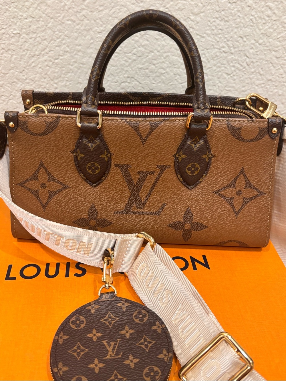 Louis Vuitton On the Go EW in Giant Reverse Monogram